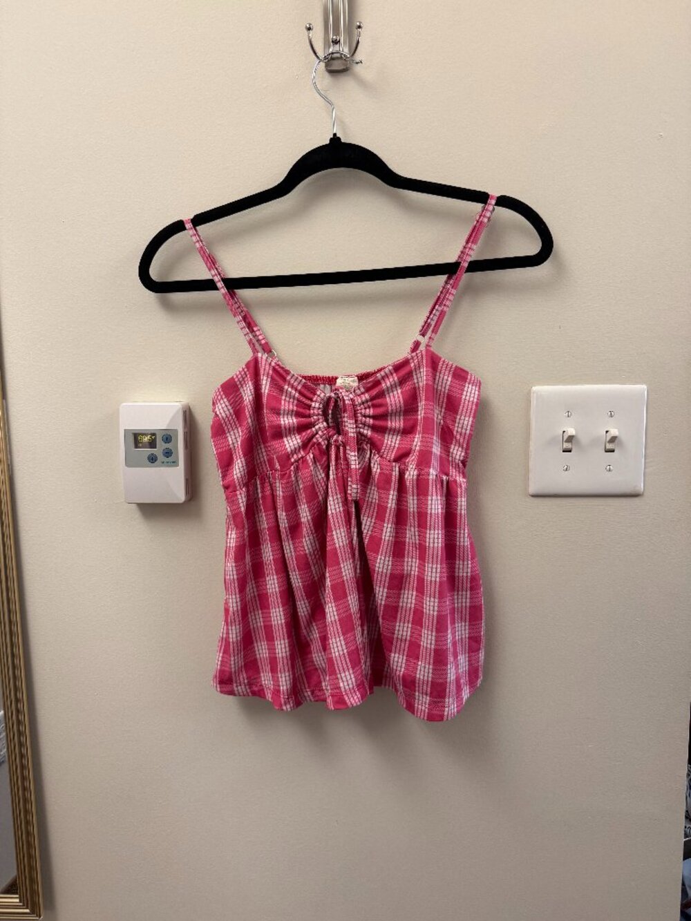 pink and white patterned tank top